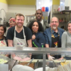 Pictured: DPD employees volunteered to prepare and serve dinner at a shelter in February 2016.