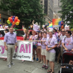 Pictured: King County Executive Dow Constantine at the 2015 Pride Parade with the King County employee group.