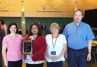 Accepting the U.S. Communities Appreciation Award for King County are (l-r) Lindsay Pryor, Sien Sok, Paula Wilz, and Mark Hoge